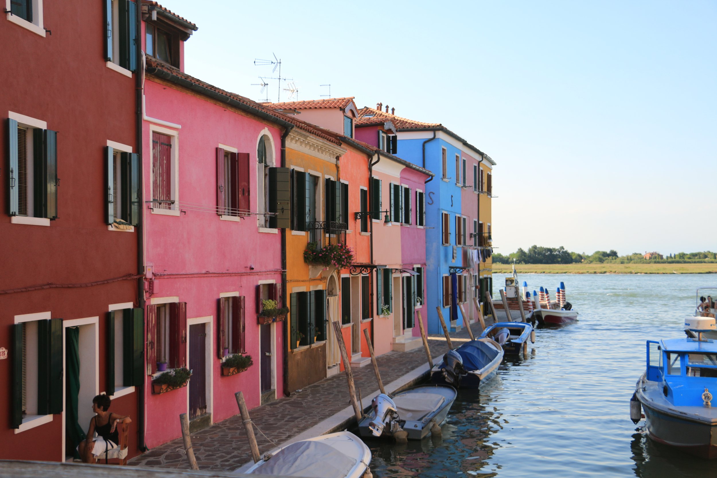 Colorful houses on murano island on a itinerary for italy trip