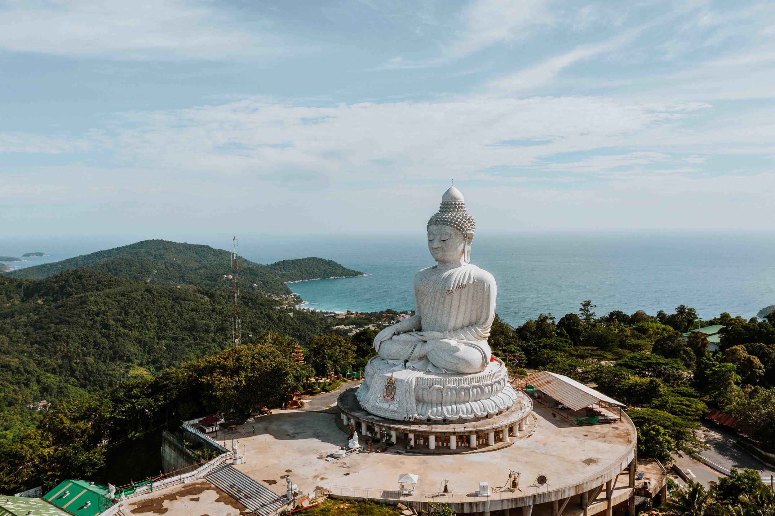 Statue of Big Buddha above Phuket with the sea behind on a phuket 7 days itinerary