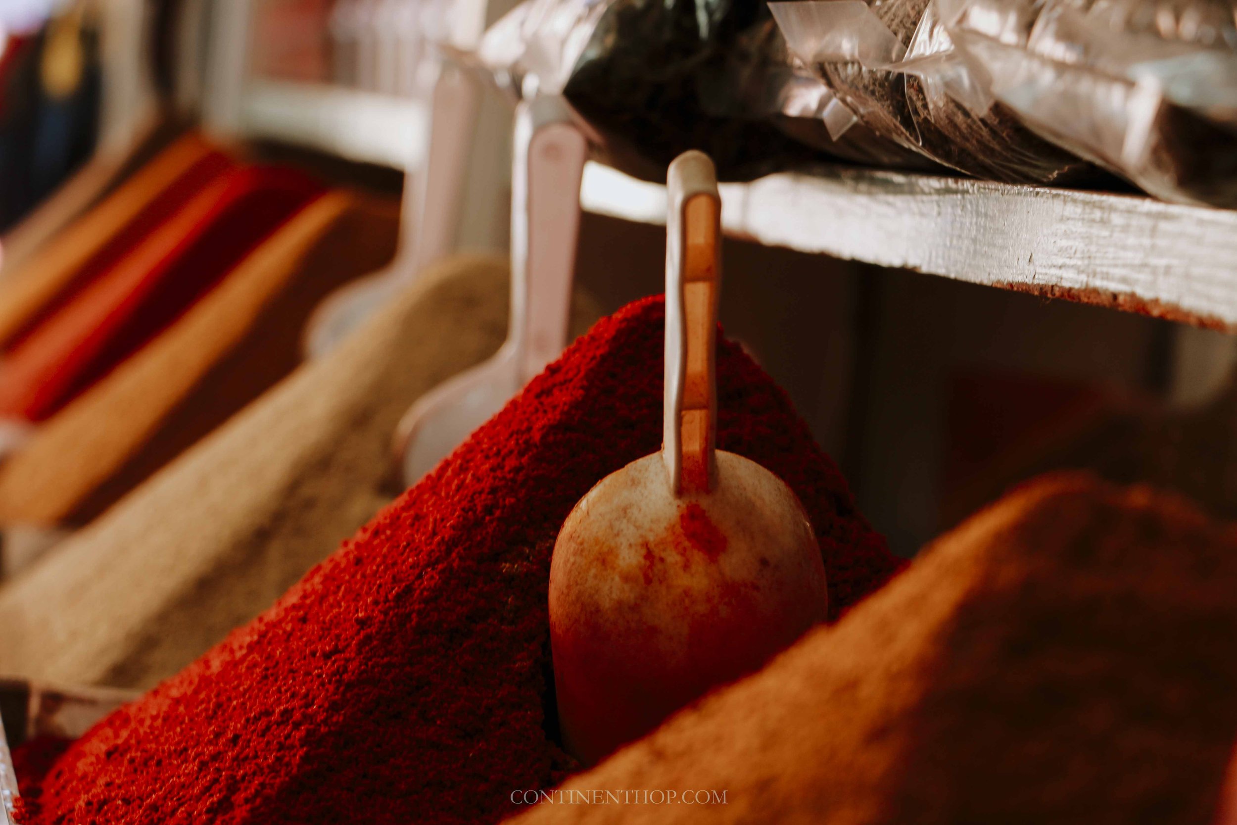 see spices in a Marrakech souk on Morocco itinerary