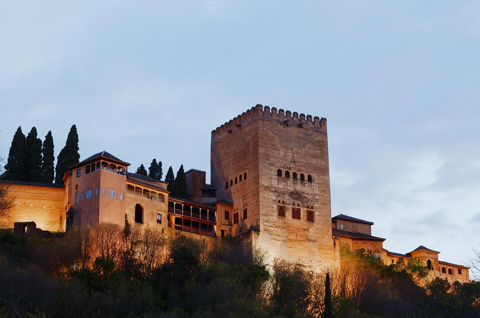 The exterior of the Alhambra by night
