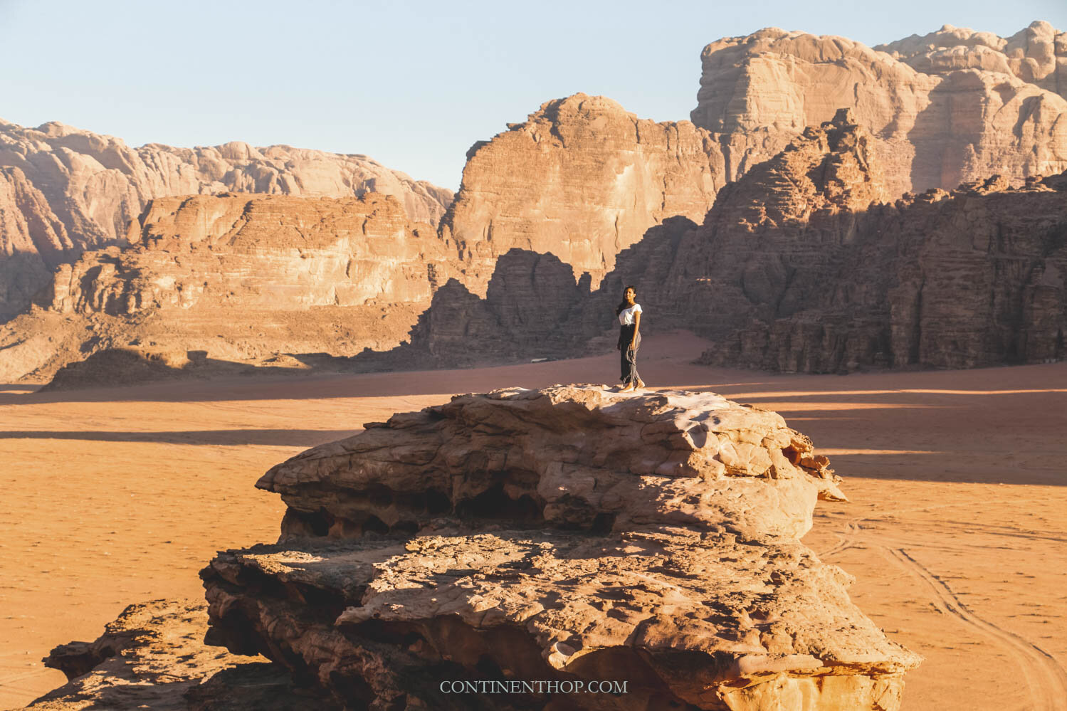 woman standing on a hill in Wadi Rum during 5 days in Jordan itinerary