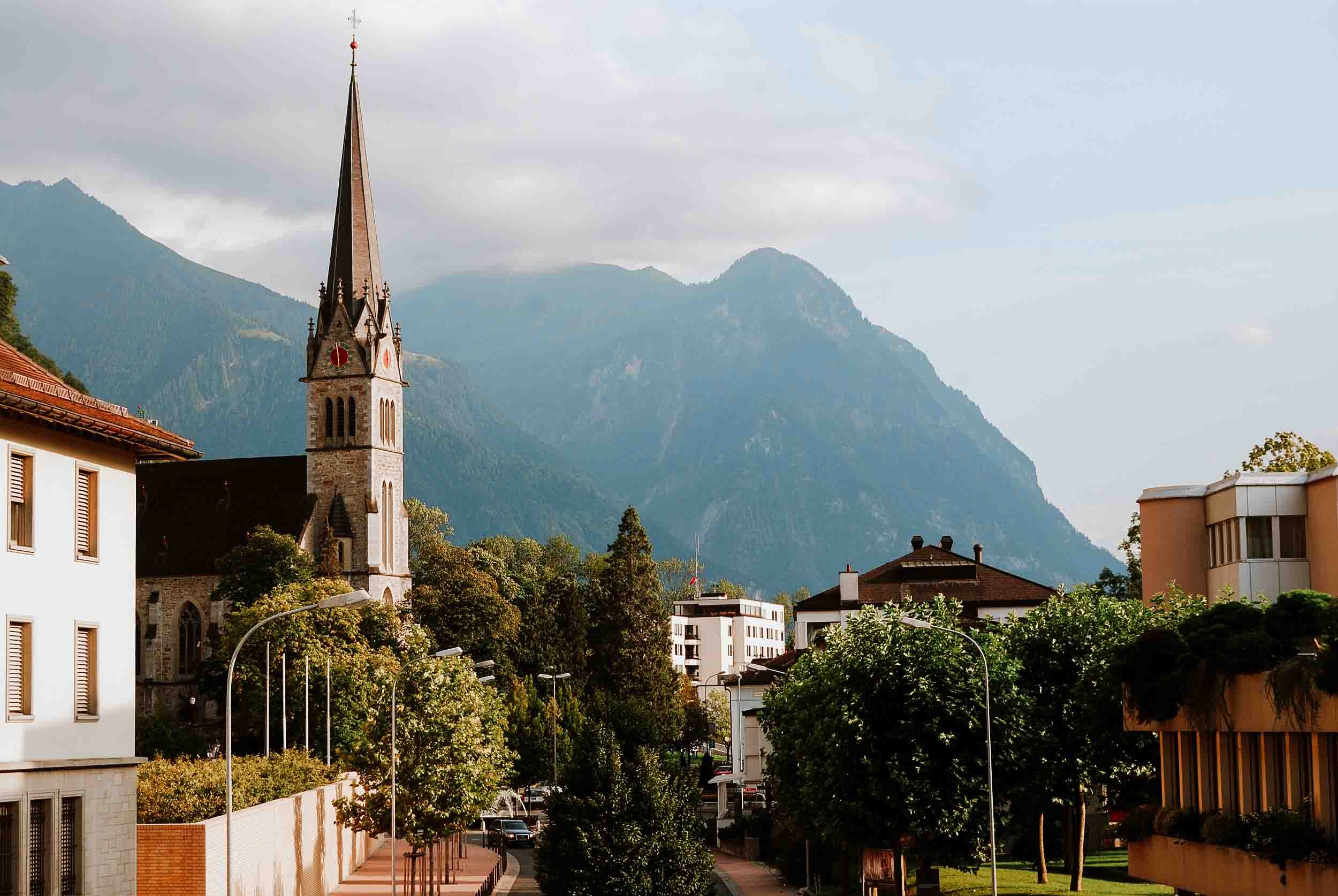 Vaduz Church and Alps on a Liechtenstein day trip from Zurich to Liechtenstein