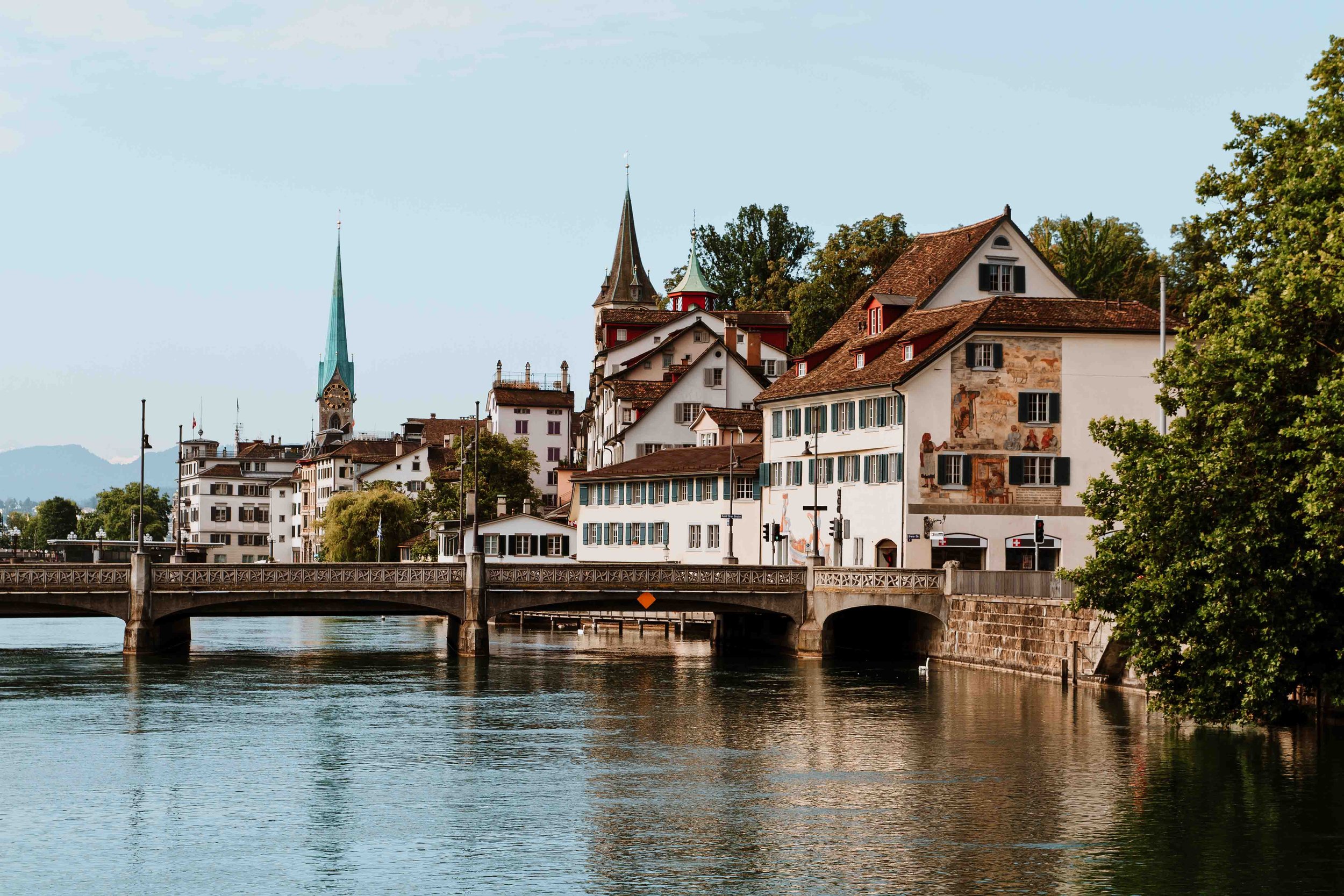Zurich cityscape by the river on a day trip to Liechtenstein