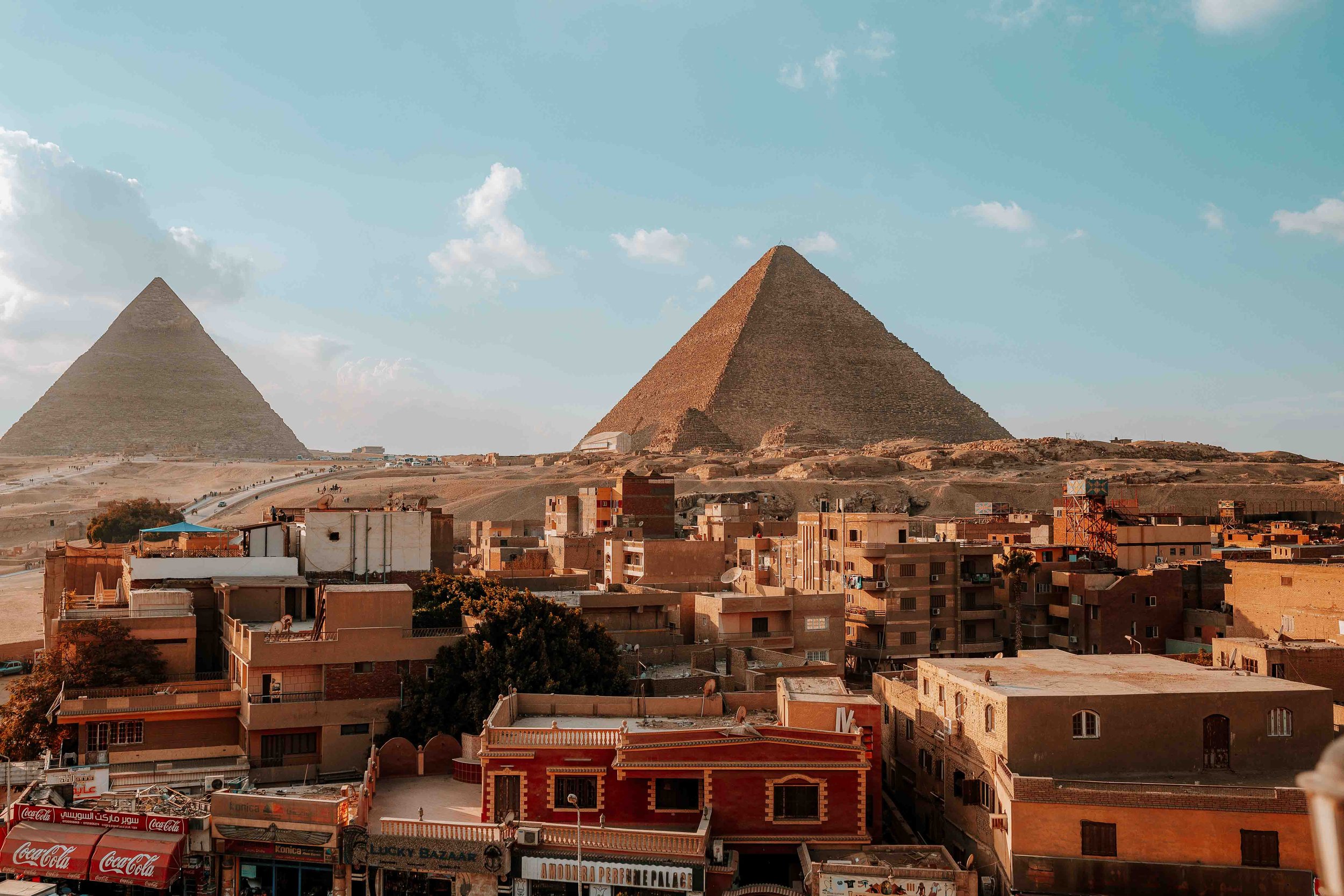 Traditional Egyptian houses at the base of the pyramids on a Egypt Itinerary 8 Days