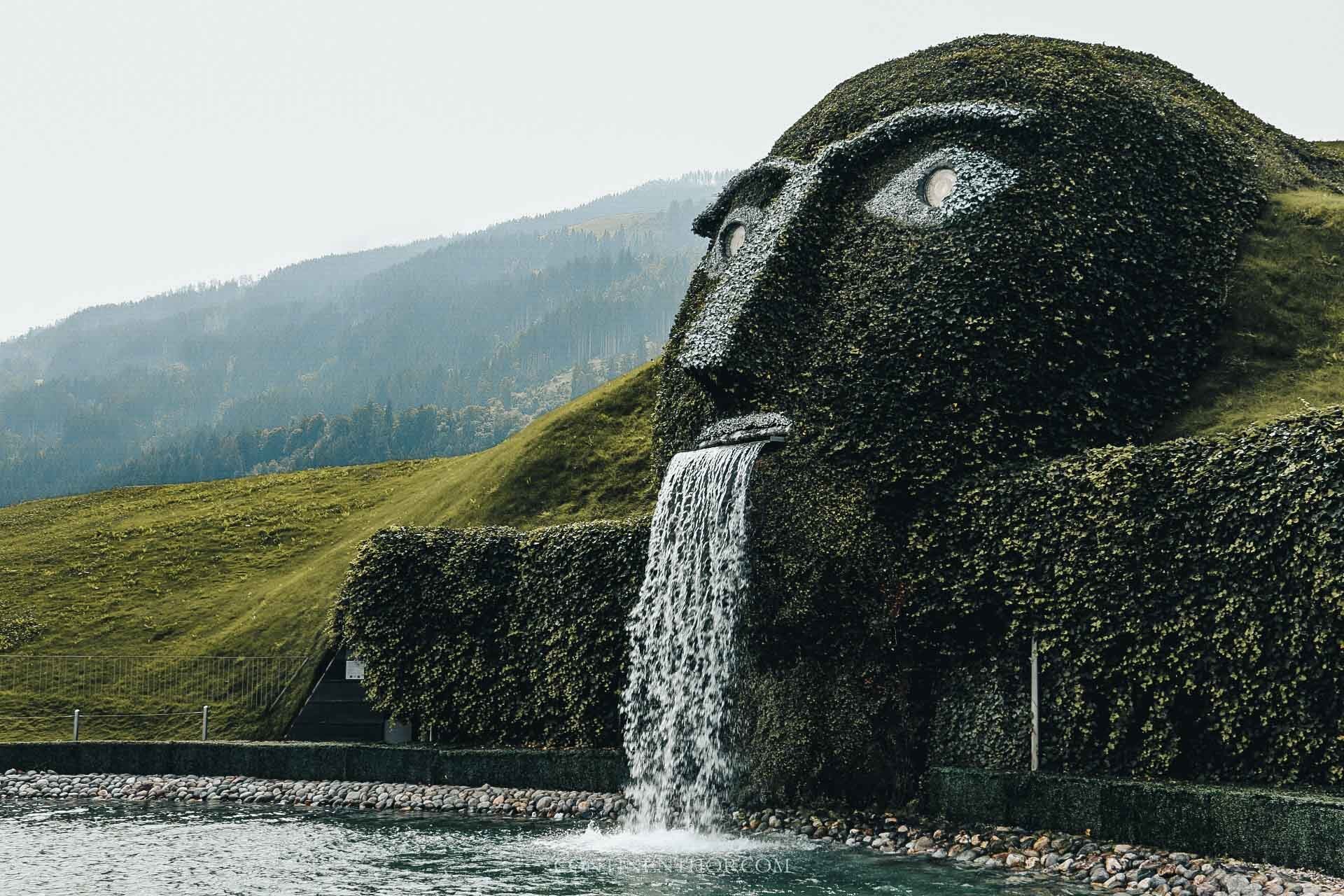 Water falling out of a landscape giant in Innsbruck best places in europe to visit in summer