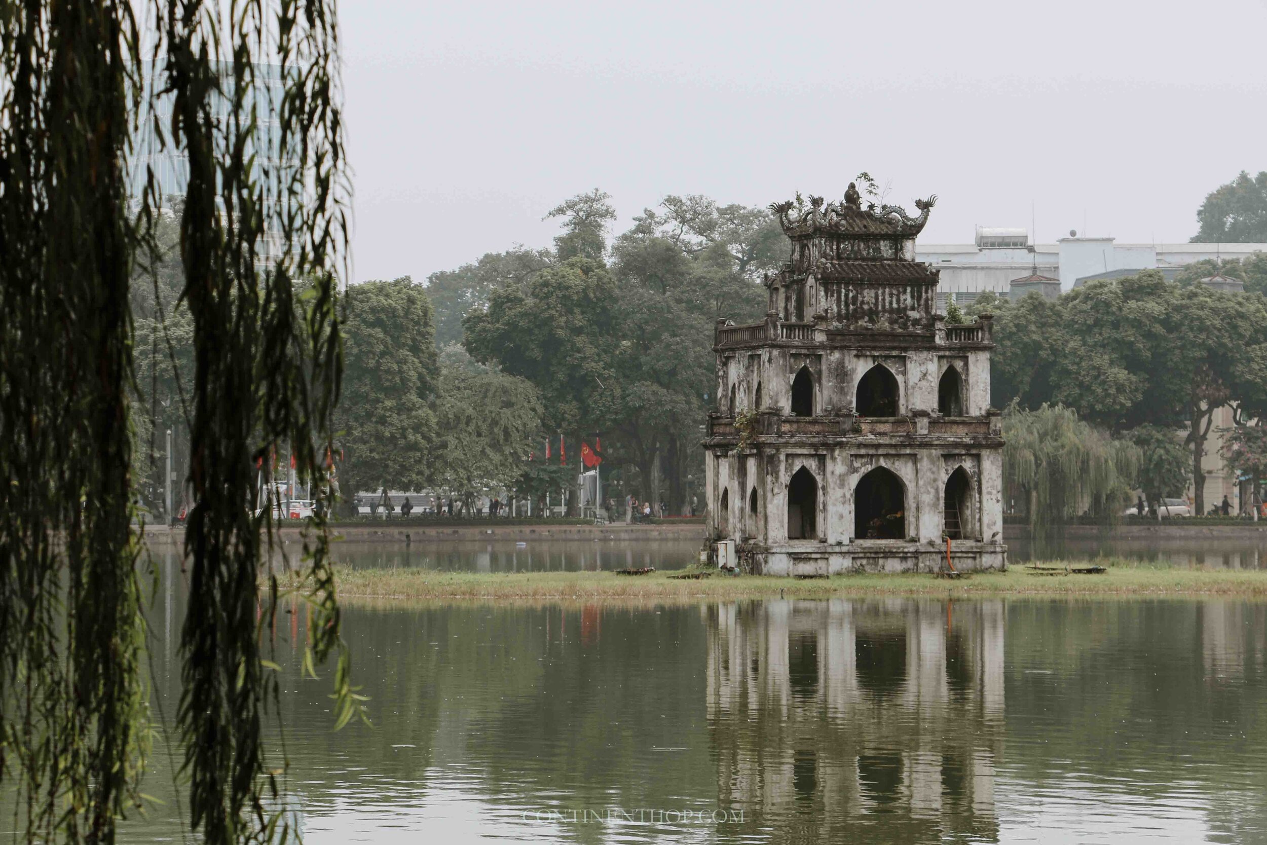 Image of the turtle temple in the middle of a lake in Hanoi Vietnam