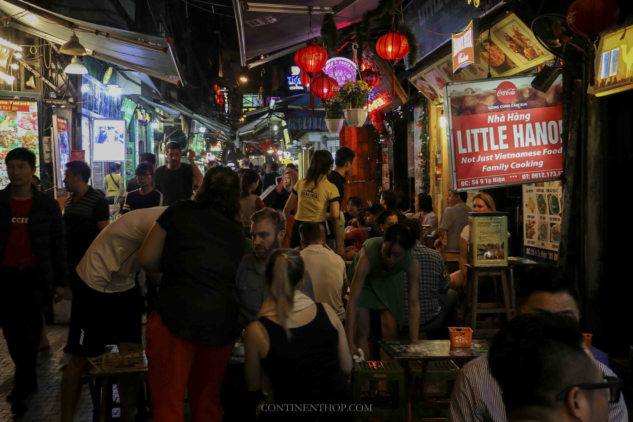 Image of people enjoying themselves in Little hanoi at night in Hanoi Vietnam