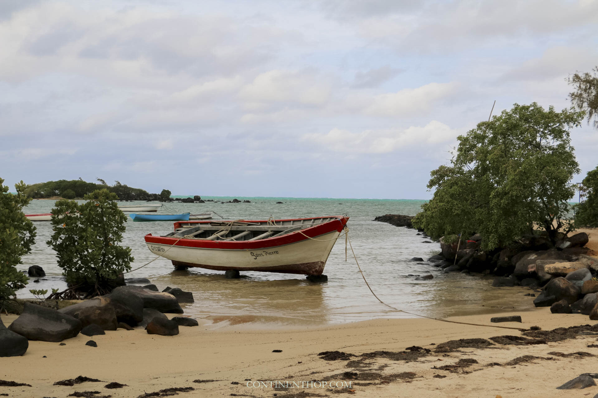 A boat moored by the beach in Mauritius