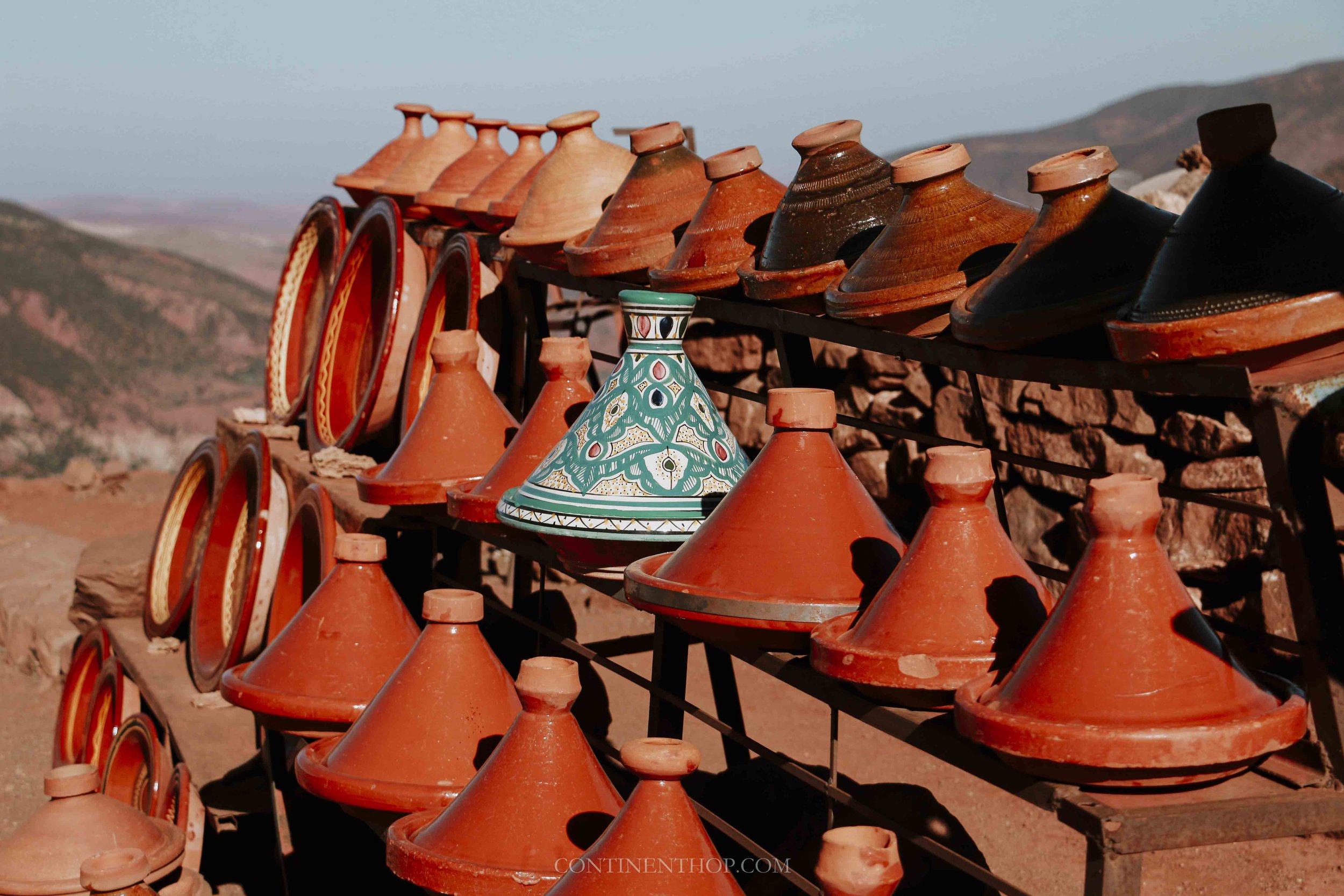 Tagines for sale by the road on a morocco desert trip