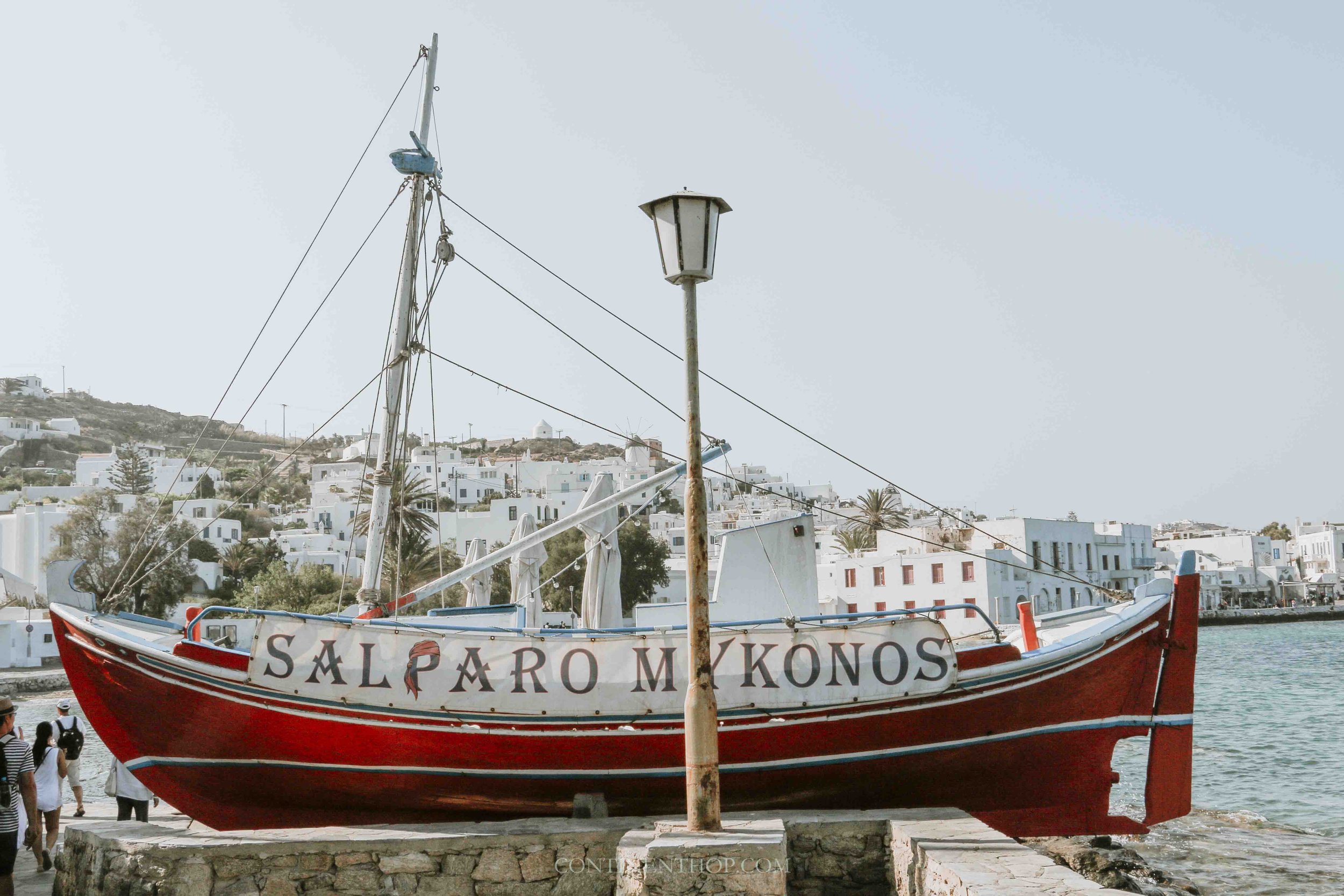 Red boat my pier on Mykonos itinerary one day in Mykonos
