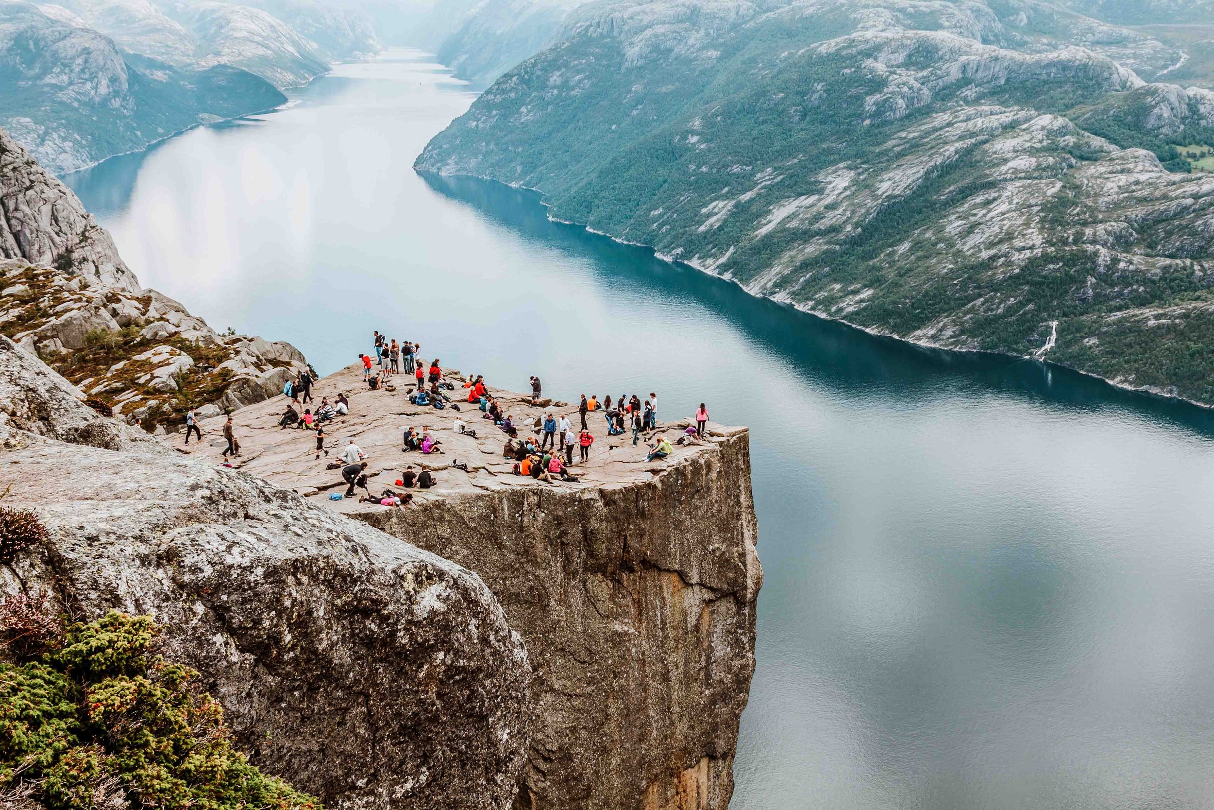 People resting at Pulpit rock in Norway on a 10 day Scandinavia itinerary