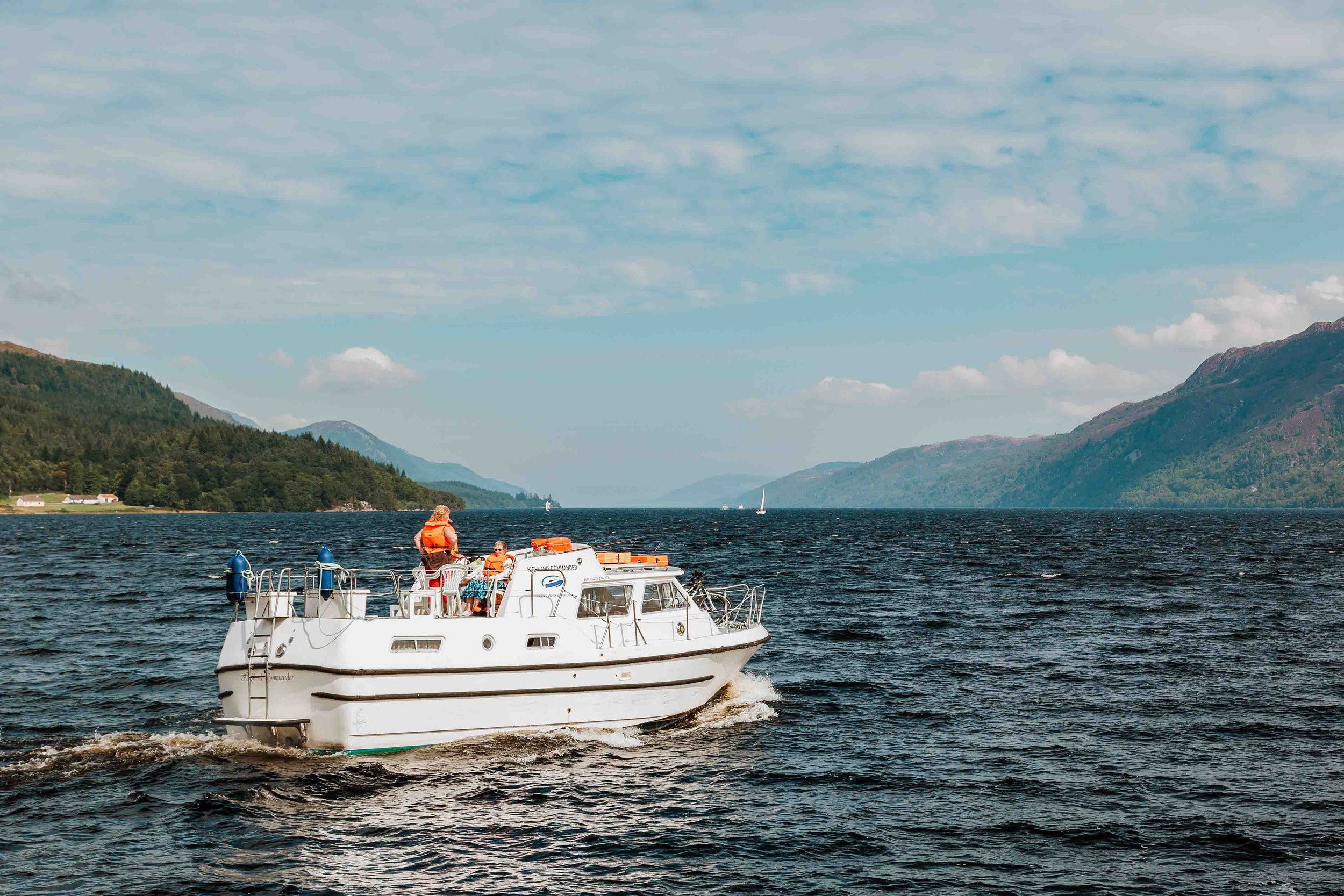A couple enjoying a cruise on Loch Ness in Scotland in Spring in Inverness