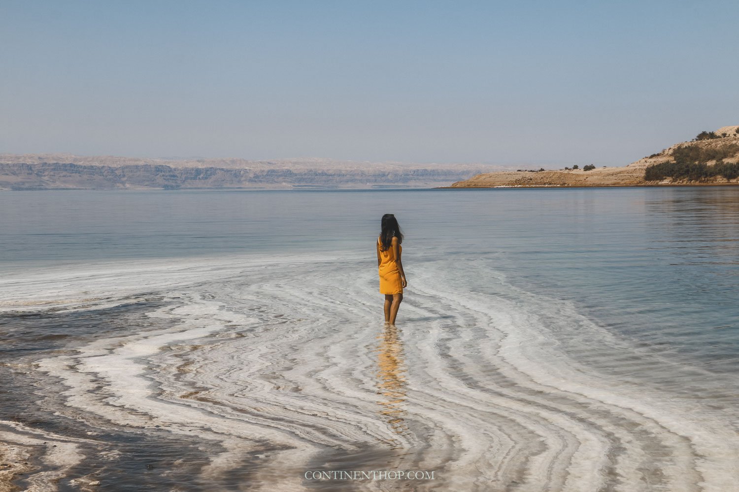 Woman visiting the dead sea jordan