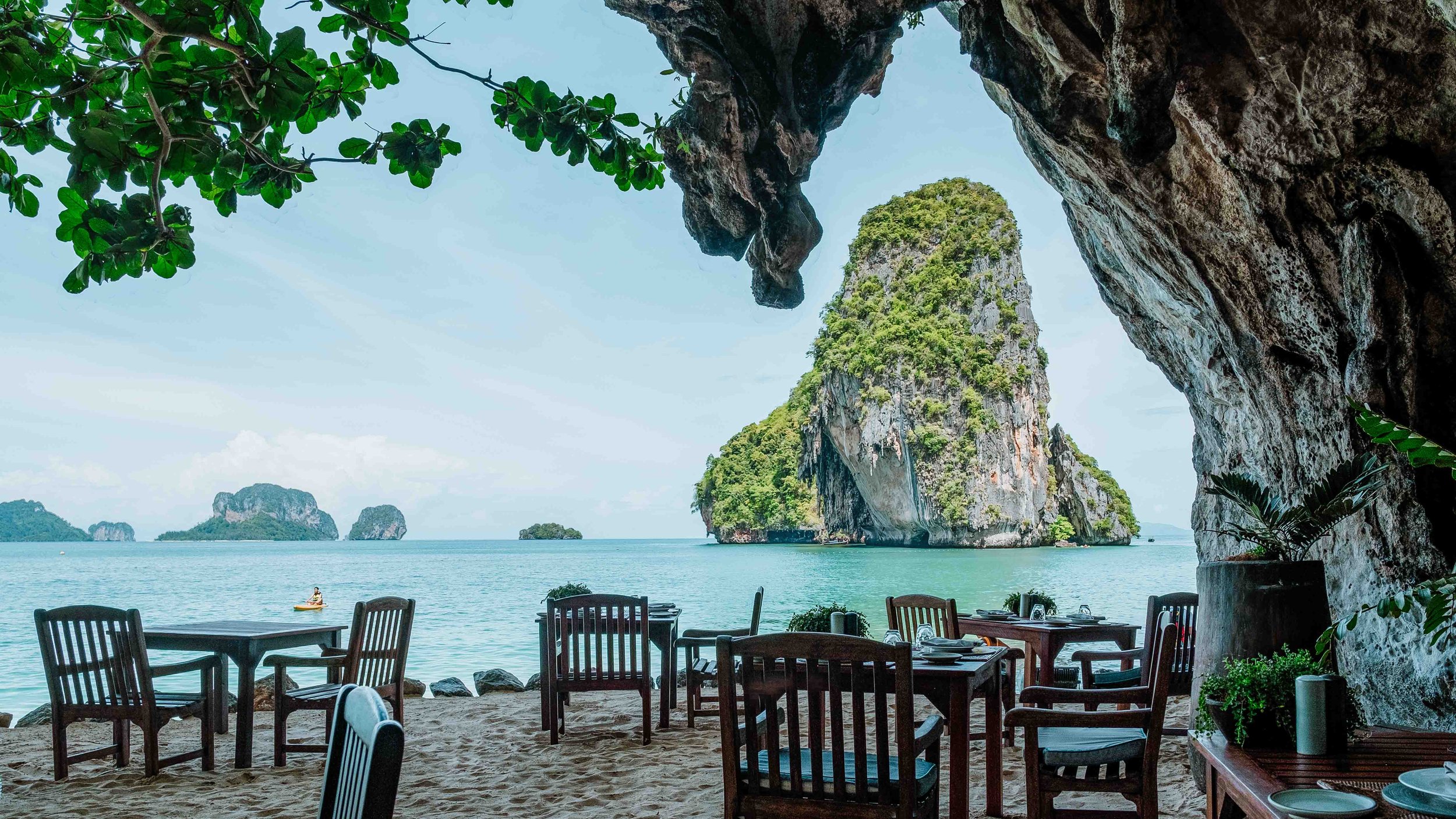Railay beach in Thailand with huge rock in sea on 1 month Thailand itinerary