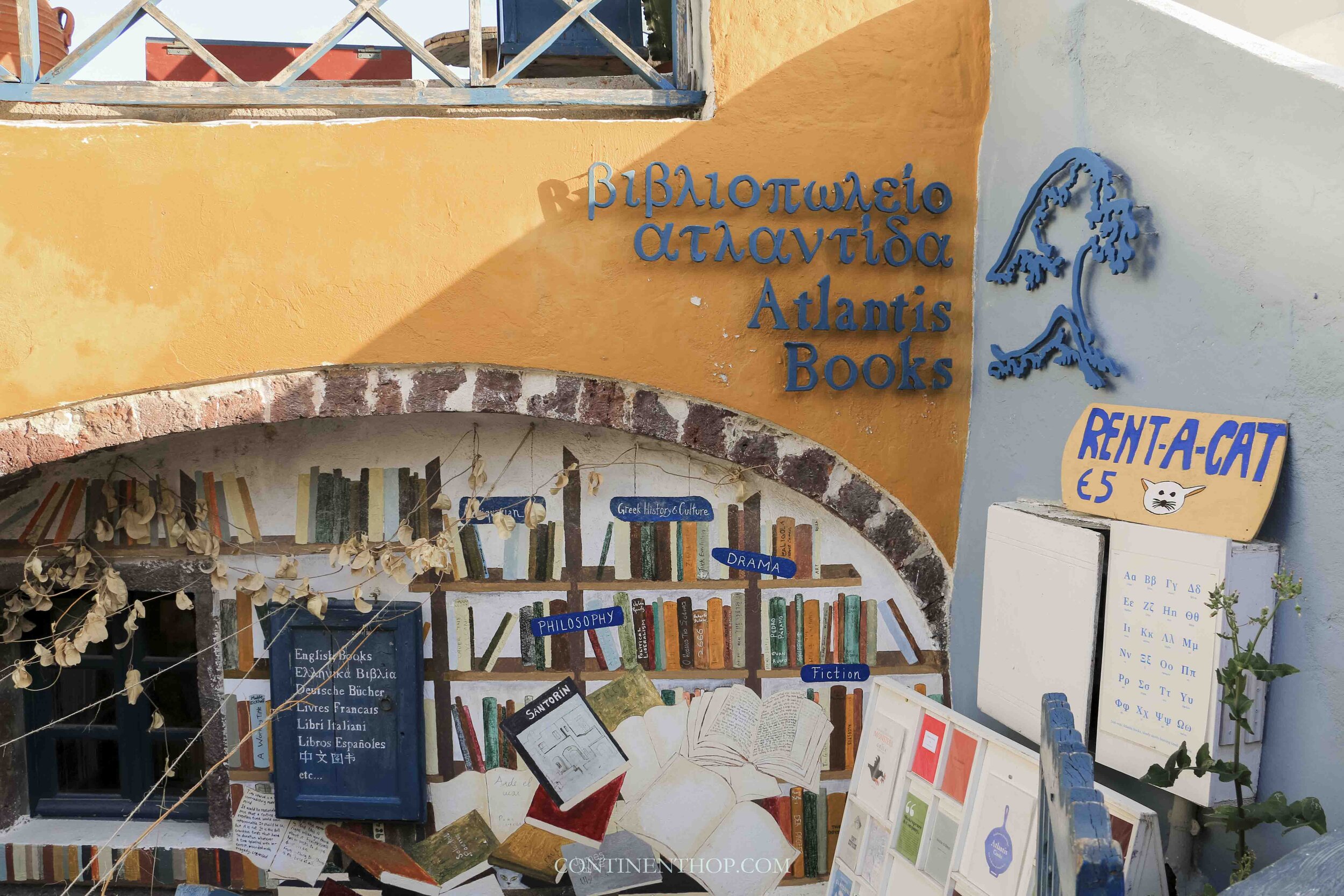 Things to do in Oia Santorini - visit A colorful bookstore called Atlantis