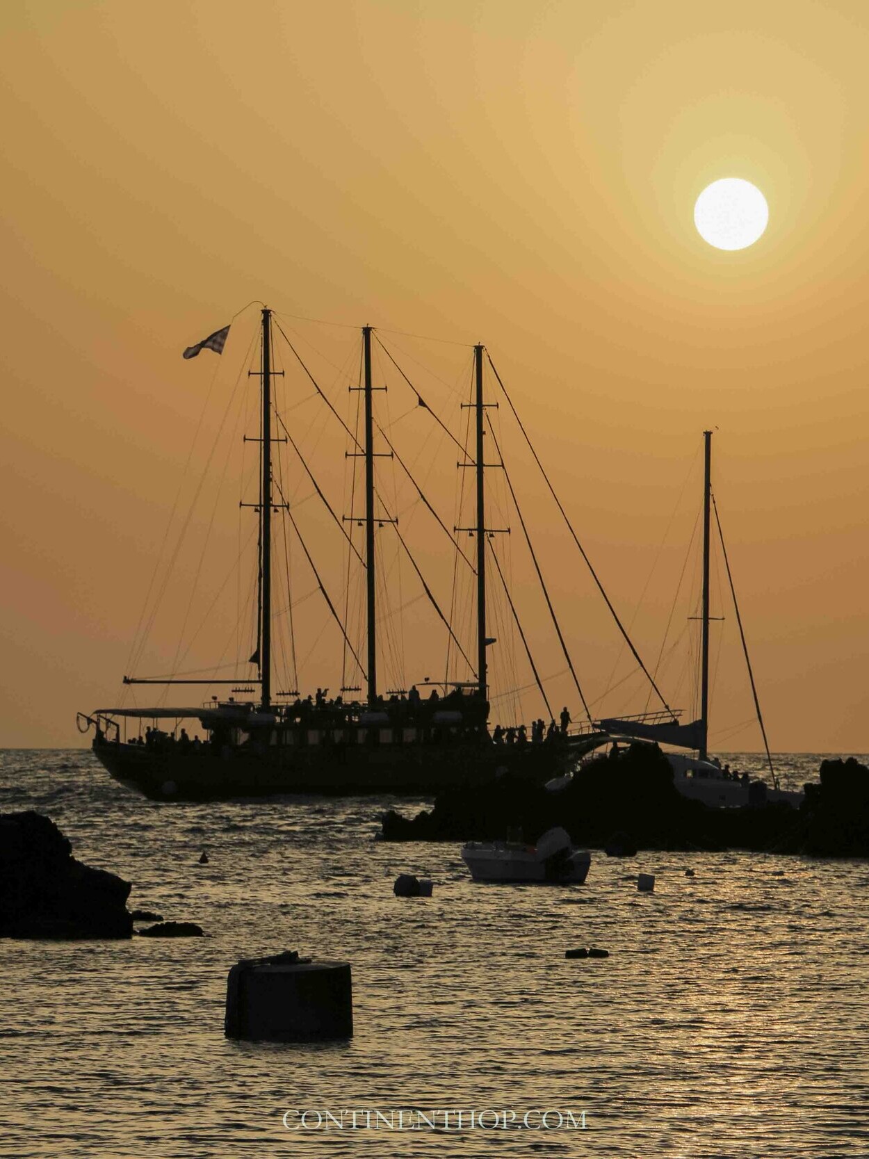 Two catamarans in the sunset, , things to do in Oia Santorini