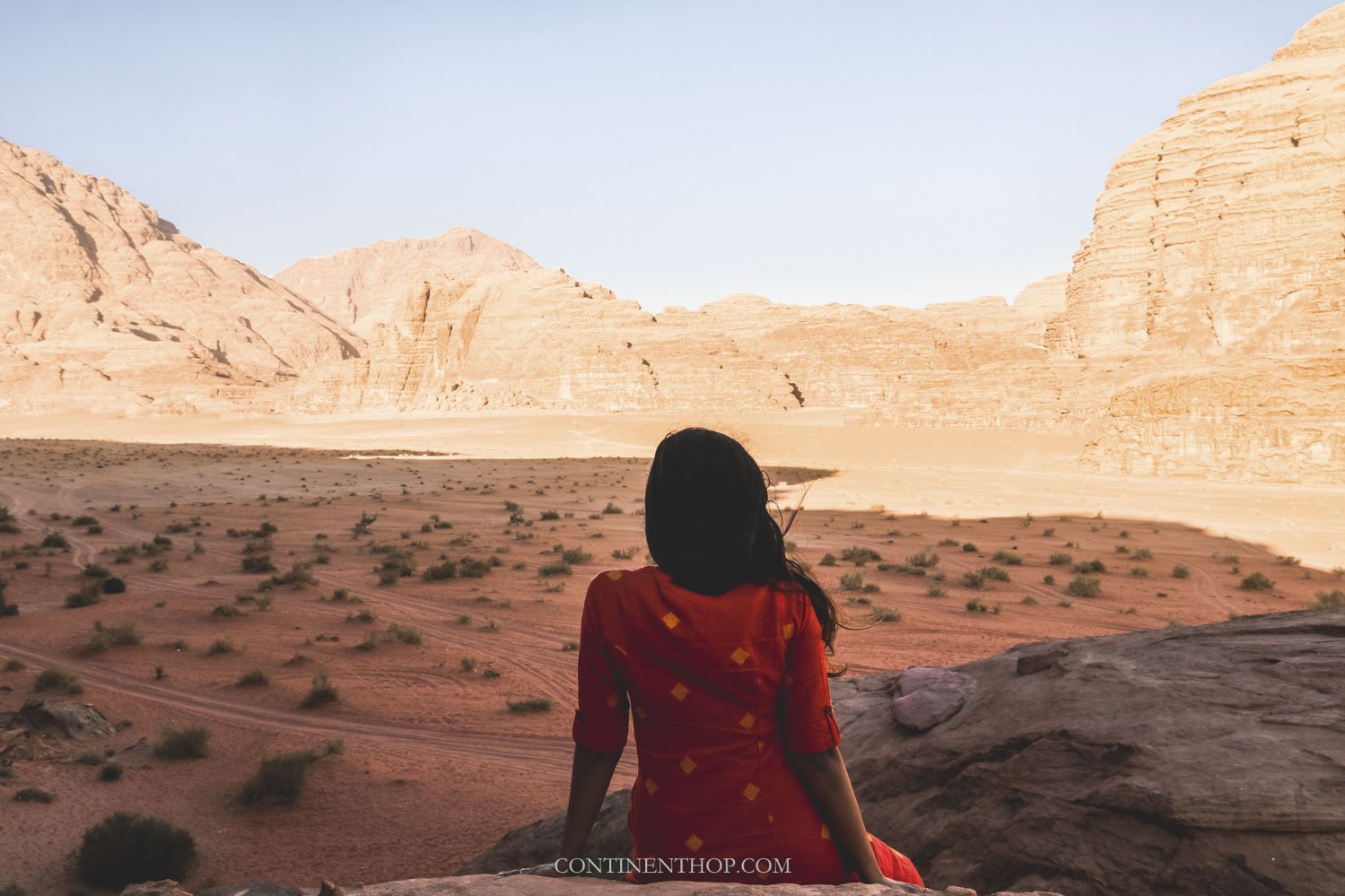 Woman camping in Wadi Rum Jordan
