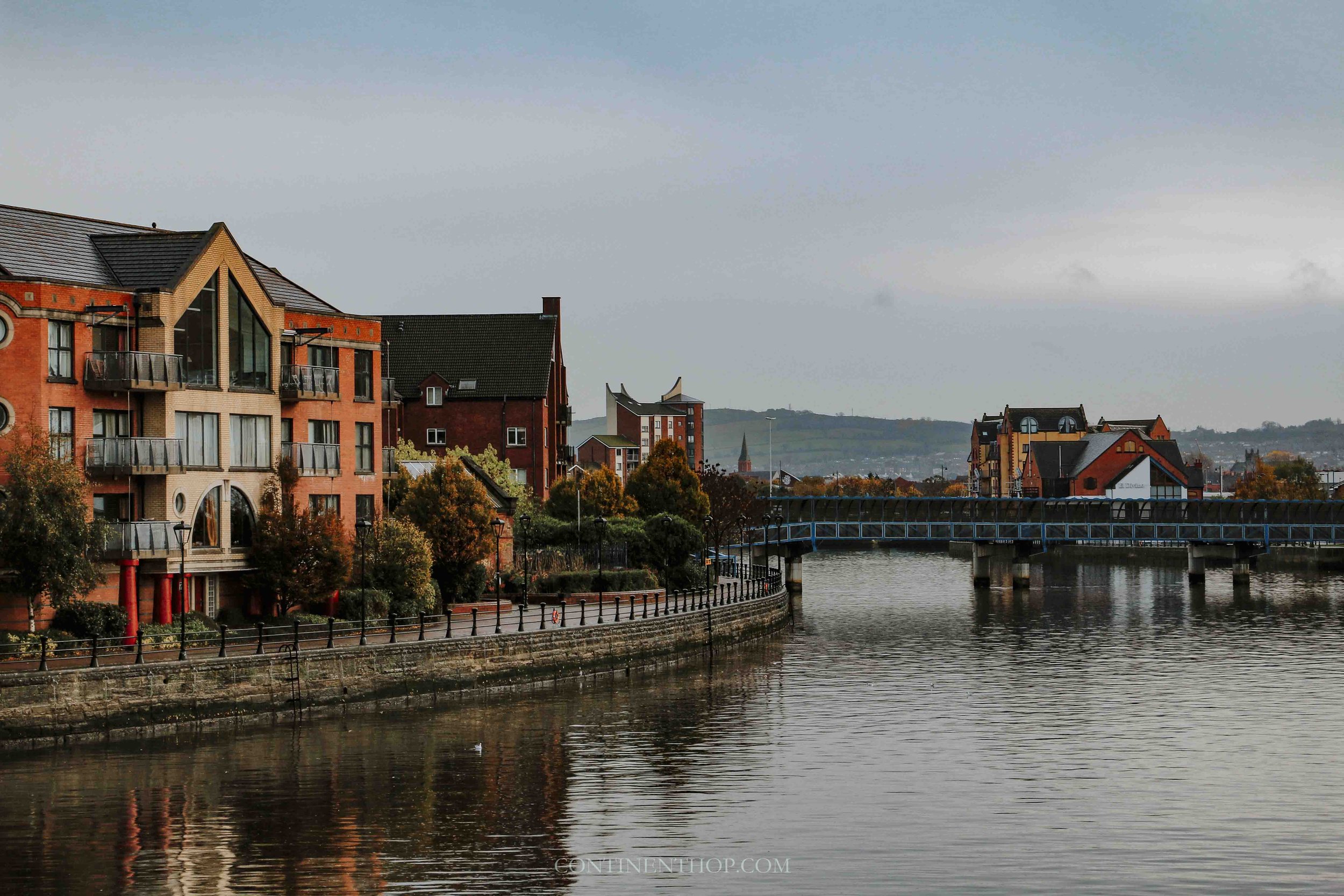 Colourful buildings by the lagan river in belfast on Causeway coastal way causeway coastal route itinerary