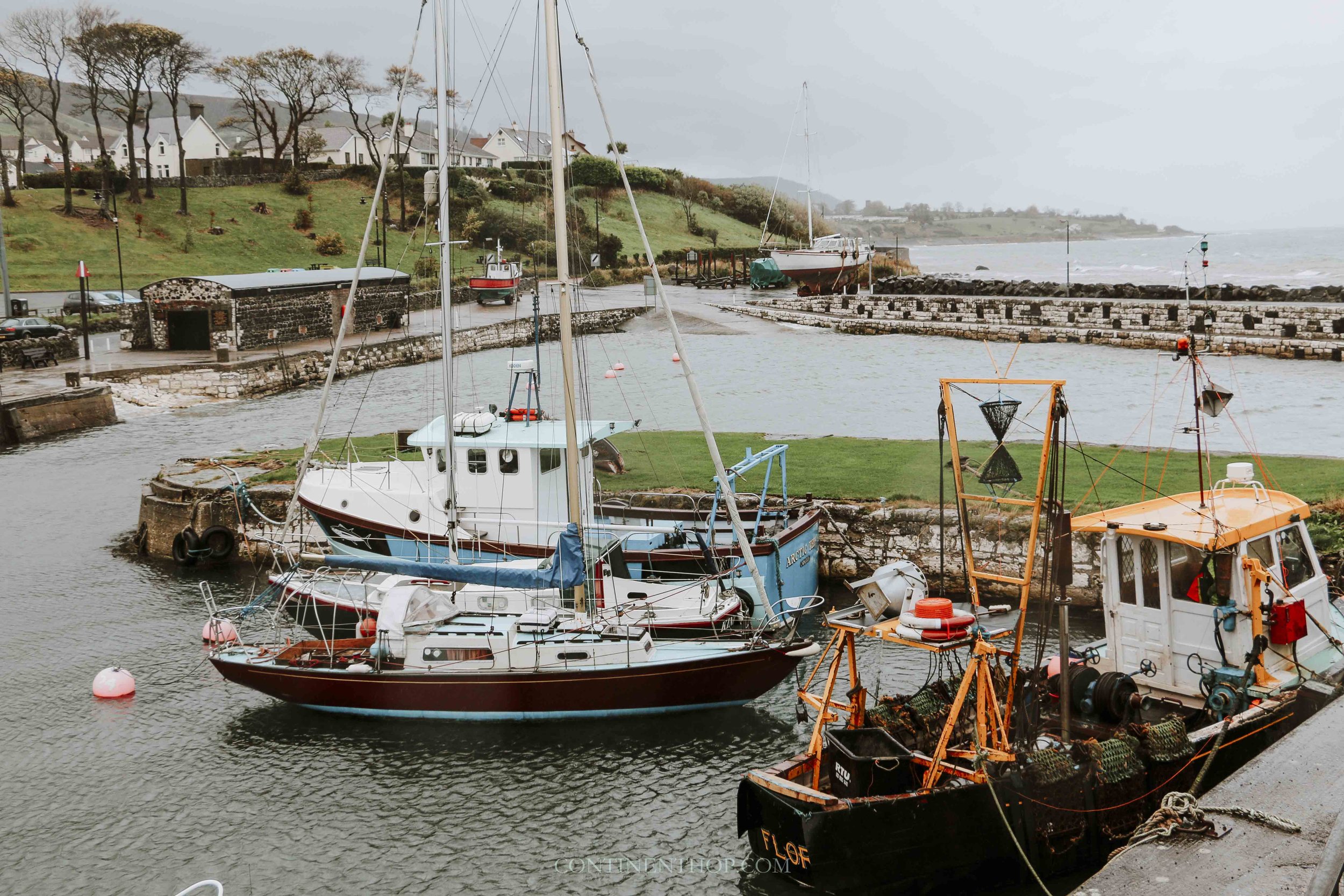 Boats in Village of Carnlough on northern ireland road trip