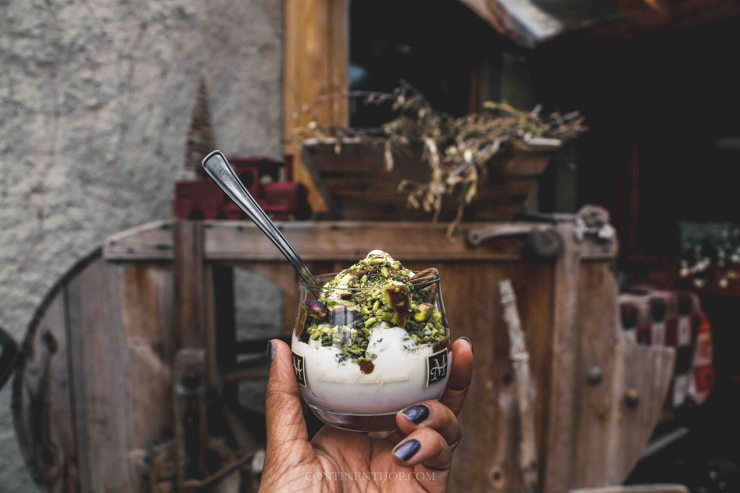 Fresh gelato in a cup with pistachios at Fattoria Le Mandre