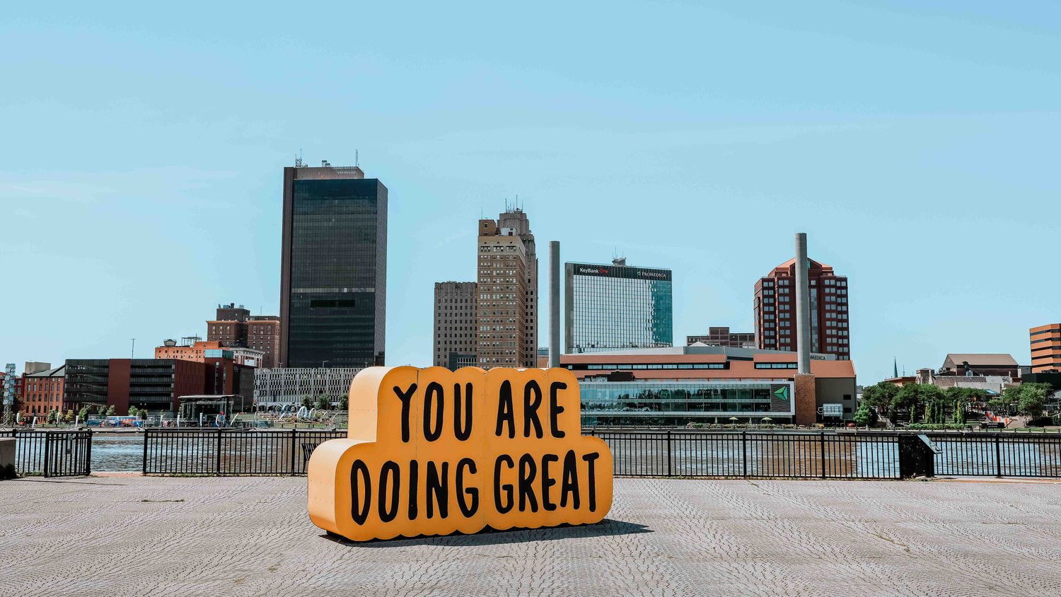 You are doing great sign along Maumee River in Toledo, downtown.