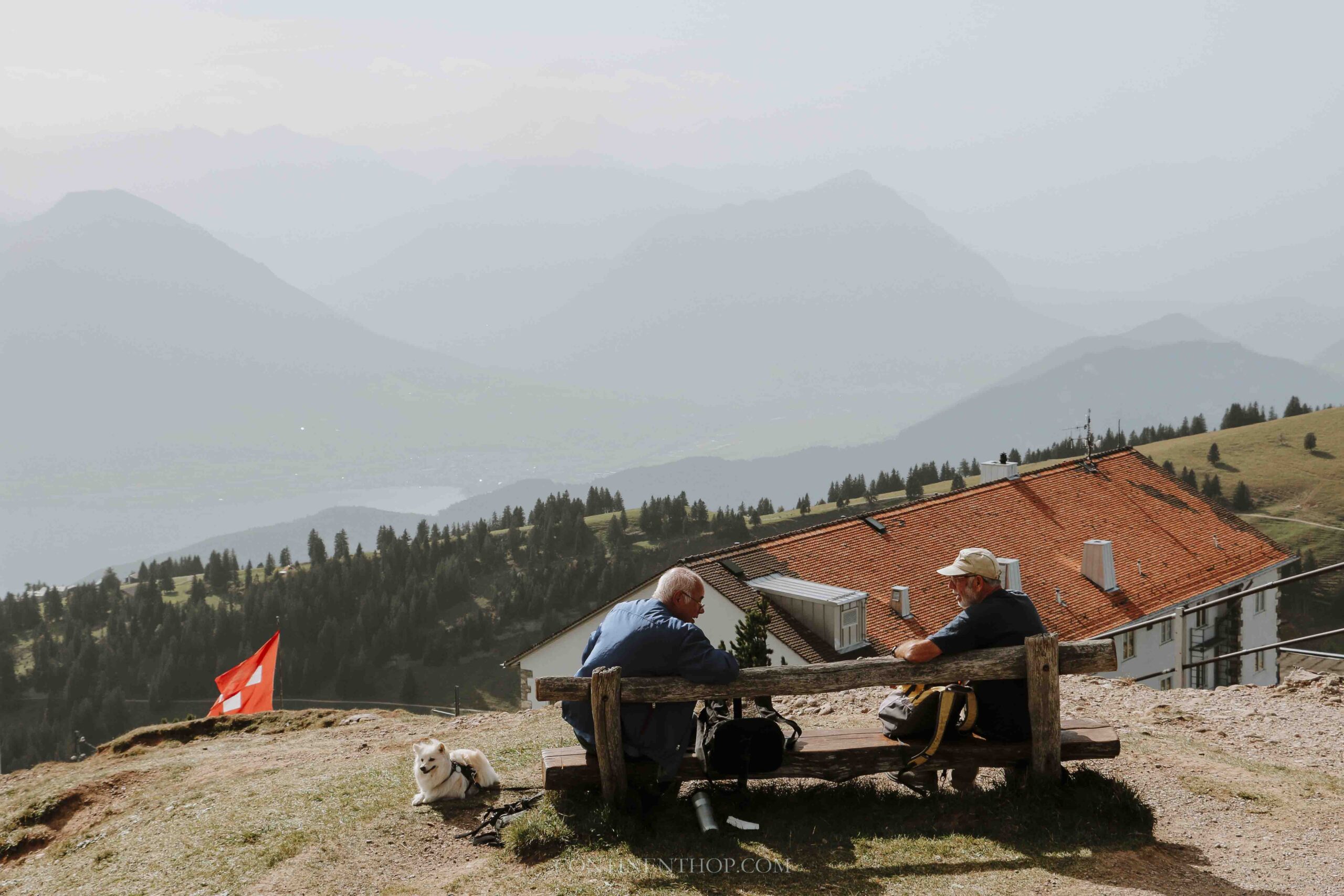 2 people chatting on mount rigi on a 2 weeks Switzerland itinerary