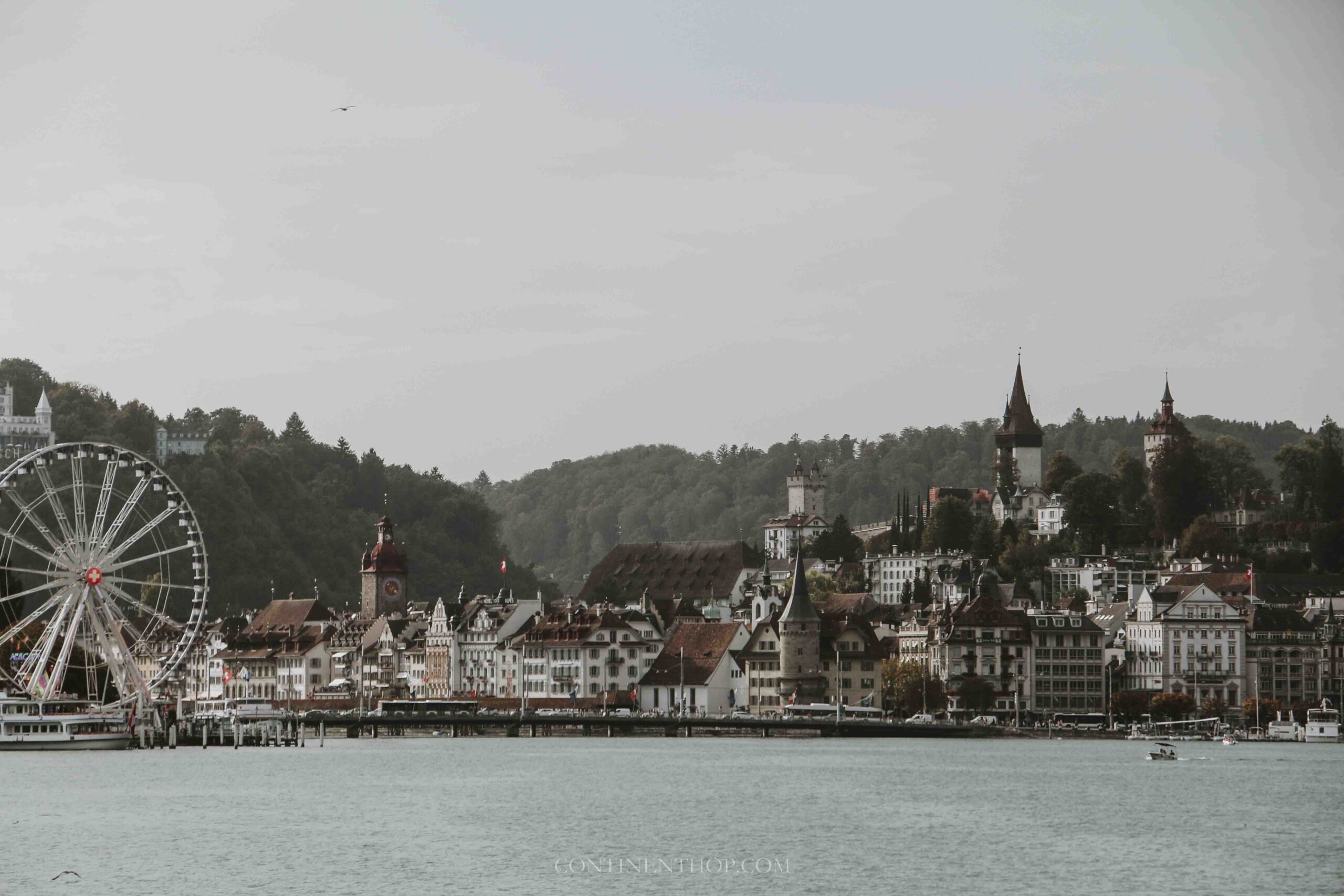 Cityscape of Lucerne by the river on a Switzerland 2 week itinerary