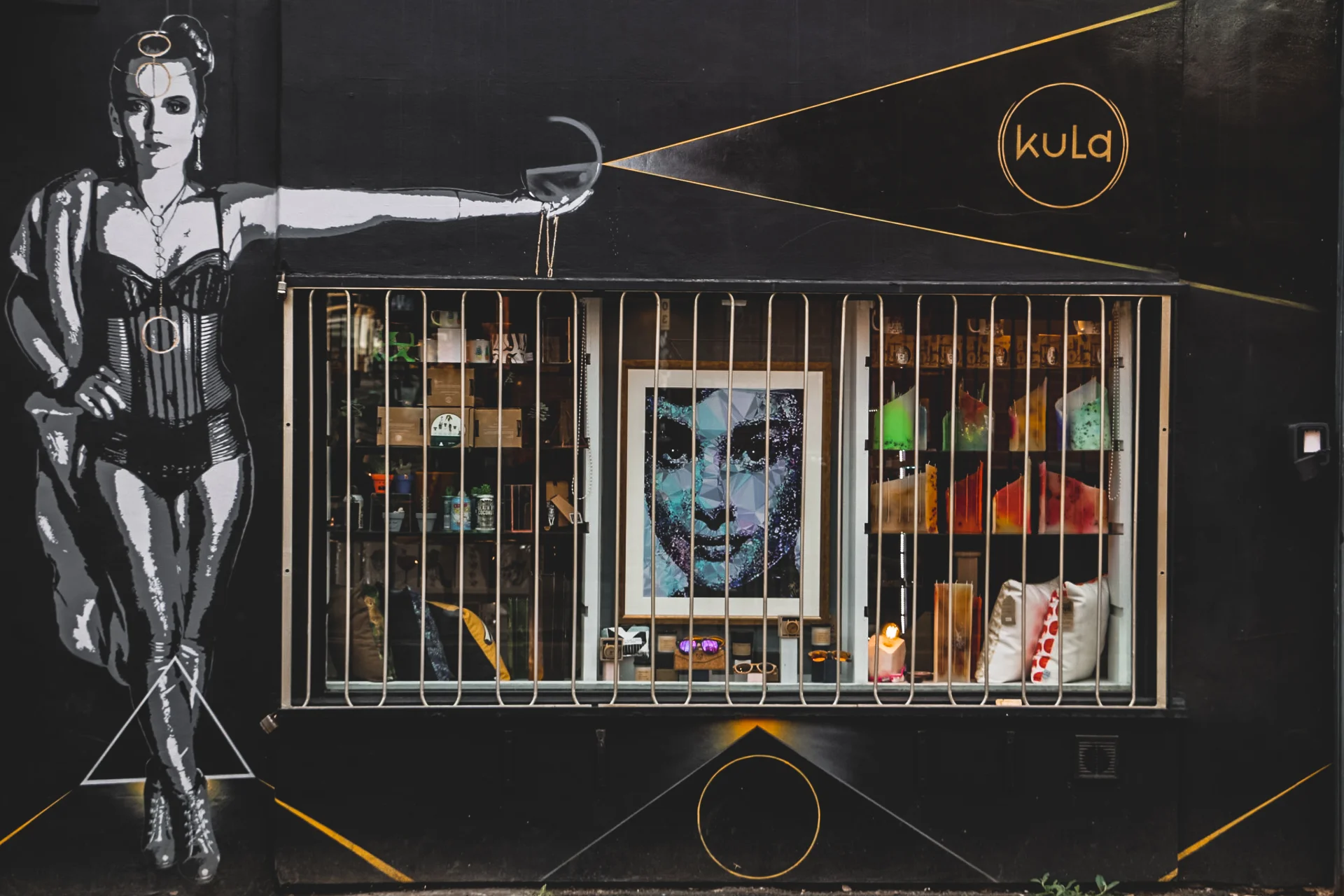 Mural of woman outside a shop